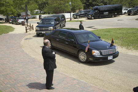 Black Presidential Limo carrying Her Majesty Queen Elizabeth II as it pulls up in front of Governor's Palace in Williamsburg, Virginia on May 4, 2007 as part of the 400th Anniversary of English settlement of Jamestown, Virginiaのeditorial素材