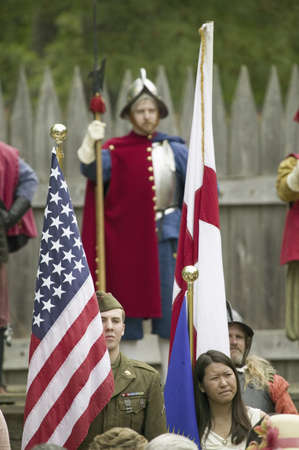 National World War II American and British Solider reenactors posing in front of 1607 Jamestown with English reenactors at James Fort, Jamestown Settlement as part of 400th Anniversary of first English Colony in New World, May 4, 2007のeditorial素材