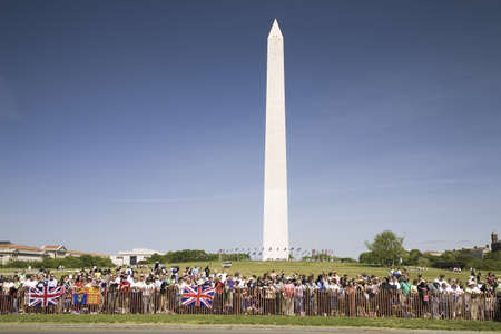 Union Jack British flag being displayed by crowds in front of the Washington Monument, Washington, DC, May 8, 2007 as part of the visit of Her Majesty Queen Elizabeth II to America for the 400th Anniversary of Jamestown Settlementのeditorial素材