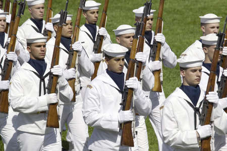 Military branches marching onto the South Lawn of the White House for the May 7, 2007 Official State Welcoming of Her Majesty Queen Elizabeth II and Prince Philip, the Duke of Edinburgh to Washington, DC and America by President George W. Bushのeditorial素材