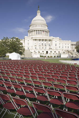 Rows of empty red chairs in front of the U.S. Capitol, Washington, DC