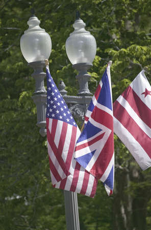 American Flag hanging with Union Jack British Flag next to the White House, Washington, DC, symbolizing the Special Relationship between England and America, the two countries that share the oldest international relationshipのeditorial素材