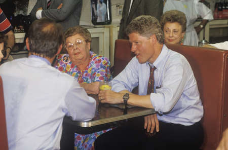 Governor Bill Clinton and Senator Al Gore meet the town's people at Dee's Restaurant on the 1992 Buscapade campaign tour in Corsicana, Texasのeditorial素材