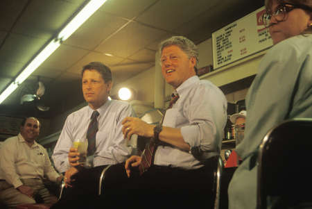 Governor Bill Clinton and Senator Al Gore meet the town's people at Dee's Restaurant on the 1992 Buscapade campaign tour in Corsicana, Texasのeditorial素材