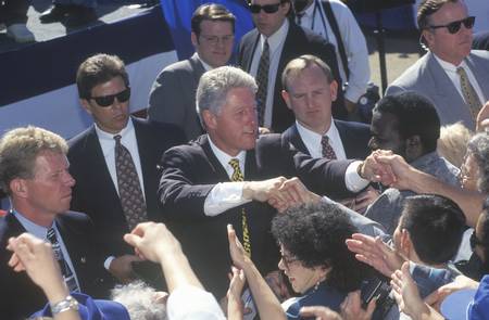 Former President Bill Clinton meets the crowd at a Santa Barbara City College campaign rally in 1996, Santa Barbara, Californiaのeditorial素材