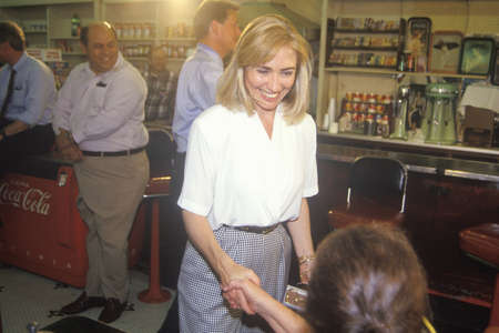 Hillary Rodham Clinton meets town's people at Dee's Restaurant during the Clinton/Gore 1992 Buscapade campaign tour in Corsicana, Texasのeditorial素材