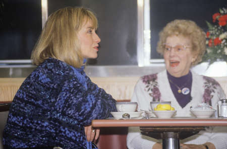 Hillary Rodham Clinton meets with townspeople at the Mayfield Diner in 1992 on Bill Clinton's final day of campaigning in Philadelphia, Pennsylvaniaのeditorial素材