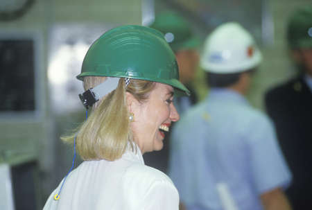 Hillary Rodham Clinton meets with workers at an electric station on the 1992 Buscapade campaign tour in Waco, Texasのeditorial素材