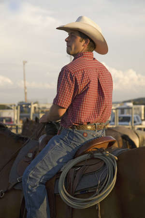 Cowboy on horse with rope at PRCA Rodeo at Lower Brule, Lyman County, Lower Brule Sioux Tribal Reservation, South Dakota, 58 miles Southeast of Pierre near Missouri River, August 10, 2007のeditorial素材