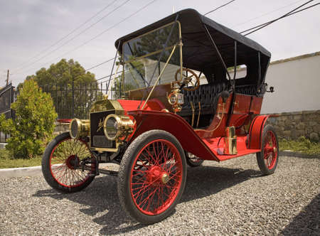Red antique car at a horseless carriage car rally in Santa Paula, CA 