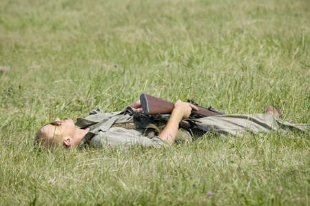 World War II reenactment of a battle between American infantryman and German soldiers with casualty at Mid-Atlantic Air Museum World War II Weekend and Reenactment in Reading, PA held June 18, 2008のeditorial素材