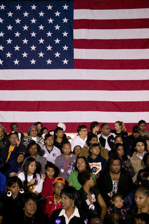 Crowd in front of American flag during Barack Obama Presidential Rally, October 29, 2008 in Rocky Mount High School, North Carolinaのeditorial素材
