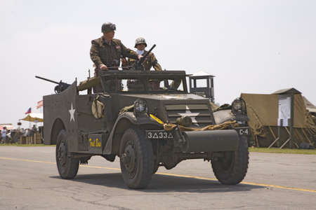 Actor of General George Smith Patton, Jr. stands up in jeep during reenactment parade of World War II in Reading, Pennsylvania, June 18, 2008のeditorial素材