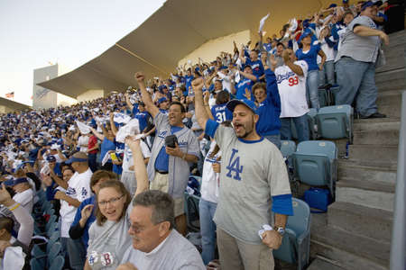 Dodger fans cheering during National League Championship Series (NLCS), Dodger Stadium, Los Angeles, CA on October 12, 2008のeditorial素材