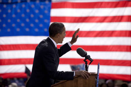 Presidential Candidate Barack Obama framed against American Flag at early vote for change Presidential rally, October 29, 2008 at Halifax Mall, Government Complex in Raleigh, NCのeditorial素材