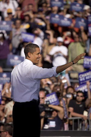 US Senator Barack Obama waving to crowd at Early Vote for Change Presidential rally, October 25, 2008 at Bonanza High School, Judy K. Cameron Stadium in Las Vegas, NVのeditorial素材