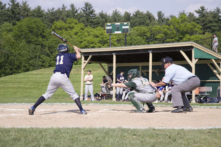 High school batter for Shrewsbury Colonials plays against Nashoba Chieftans baseball team in...