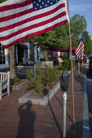 American Flags line store fronts of historic Lexington, MA on Memorial Day, 2011のeditorial素材
