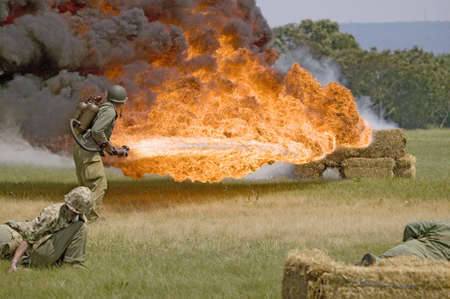 World War II reenactment of a battle between American infantryman and German soldiers, at Mid-Atlantic Air Museum World War II Weekend and Reenactment in Reading, PA held June 18, 2010のeditorial素材