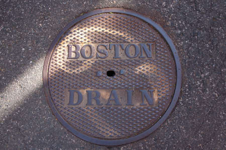 Manhole cover on Boston street のeditorial素材