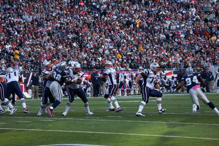 Gillette Stadium, Foxborough, MA - October 16, 2011 - Quarterback Tom Brady #12, New England Patriots passes in the game between New England Patriots vs Dallas Cowboysのeditorial素材