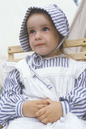Young girl as participant in period costume during recreation of Battle of Manassas, Virginiaのeditorial素材