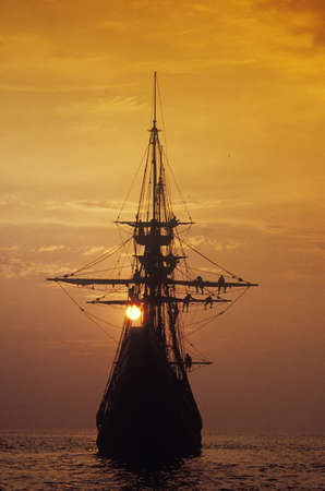 Silhouette of a replica of the Mayflower at sunset, Plymouth, Massachusettsのeditorial素材