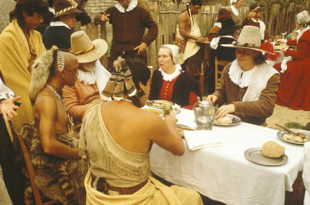 Living history reenactment of Pilgrims and Indians dining on Plymouth Plantation, Plymouth, MAのeditorial素材