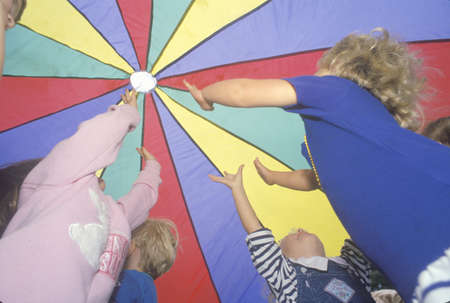 Preschool children playing a parachute game, Washington D.C.のeditorial素材