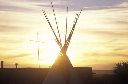 Teepee and cross silhouette on Indian reservationのeditorial素材
