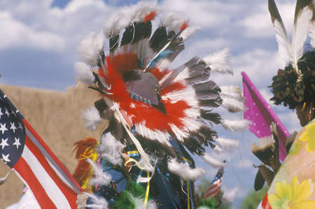 Feather headdress of Native American performing Corn Dance ceremony in Santa Clara Pueblo, NMのeditorial素材