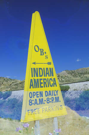 Triangular yellow Indian advertisement in southwestern United Statesのeditorial素材