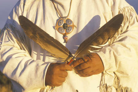 Close-up of a Native American holding ceremonial feathers, Big Sur, CAのeditorial素材