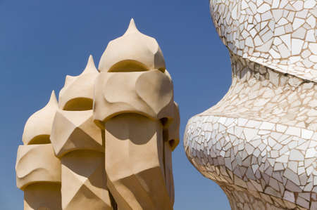 Sculptural chimneys on roof of Casa Mila, La Pedrera, by Antoni Gaudi, built between 1905-1911, Barcelona, Spainのeditorial素材
