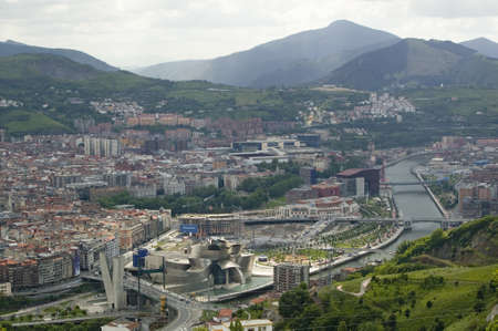 Aerial view of the Guggenheim Museum of Contemporary Art of Bilbao (Bilbo) located on the North Coast of Spain in the Basque region. Nicknamed "The Hole", this is a contemporary museum built of titanium, limestone and glass and was designed by Canadian ciのeditorial素材
