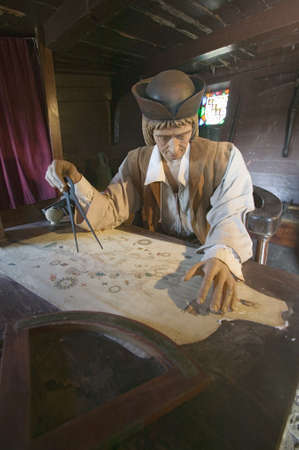 Model of Christopher Columbus at desk with map in his cabin at Muelle de las Carabelas, Palos de la...