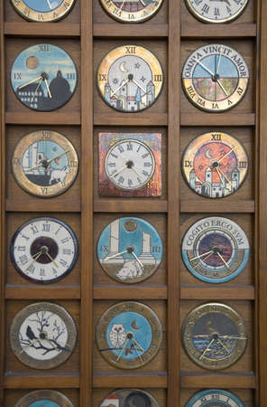 Old clocks in window of store in Rome, Italy, Europe