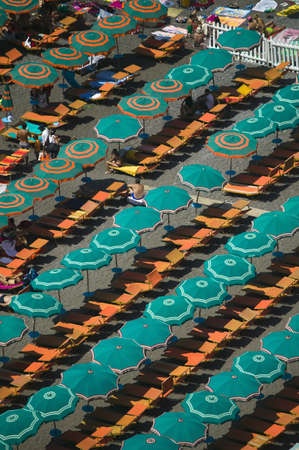 Elevated pattern view of famous beach umbrellas of Amalfi, a town in the province of Salerno, in the region of Campania, Italy, on the Gulf of Salerno, 24 miles southeast of Naplesのeditorial素材