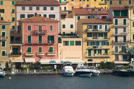 Colorful buildings and harbor of Portoferraio, Province of Livorno, on the island of Elba in the Tuscan Archipelago of Italy, Europe, where Napoleon Bonaparte was exiled in 1814のeditorial素材