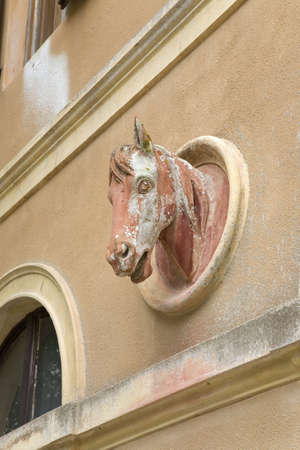 Detail of horse head sculpture on carriage house of Villa of San Martino on the island of Elba in the Tuscan Archipelago of Italy, Europe, where Napoleon Bonaparte was exiled in 1814のeditorial素材