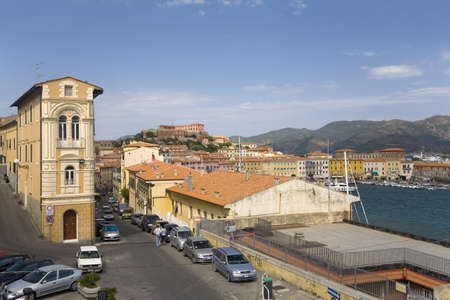 Colorful buildings and harbor of Portoferraio, Province of Livorno, on the island of Elba in the Tuscan Archipelago of Italy, Europe, where Napoleon Bonaparte was exiled in 1814のeditorial素材