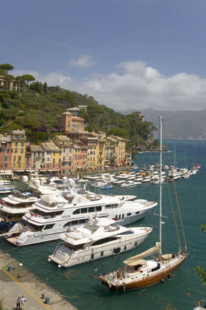 View of Portofino's Riviera di Levante and it's colorful buildings and harbor, a small Italian fishing village in the province of Genoa on the Italian Riviera on the Mediterranean Sea, Italy, Europeのeditorial素材