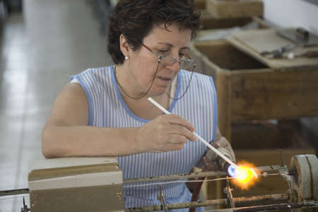 Woman working on famous pearls of Majorca, the largest island of Spain, Europe on the Mediterranean Sea and part of Balearic Islands archipelagoのeditorial素材