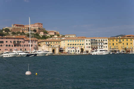 Colorful buildings and harbor of Portoferraio, Province of Livorno, on the island of Elba in the Tuscan Archipelago of Italy, Europe, where Napoleon Bonaparte was exiled in 1814のeditorial素材