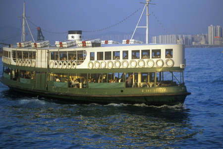 Star Ferry in Hong Kong Harbor with skyline in background