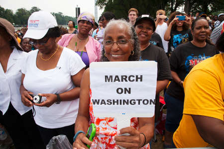 Audiences on the National Mall listen to Presidential speeches at the Let Freedom Ring ceremony at the Lincoln Memorial August 28, 2013 in Washington, DC, commemorating the 50th anniversary of Dr. Martin Luther King Jr.'s 'I Have a Dream' speech.のeditorial素材
