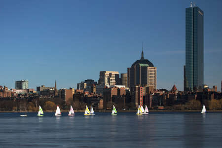 Boston Skyline, sail boats and Prudential Bld. in winter on half frozen Charles River, Massachusetts, USAのeditorial素材