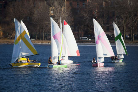 Colorful sailboats and Boston Skyline in winter on Charles River, Massachusetts, USAのeditorial素材