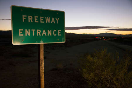 Freeway Entrance road sign at sunset, onto Interstate 10, California, USAの写真素材