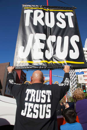 Sign reads ""Trust Jesus"" signのeditorial素材